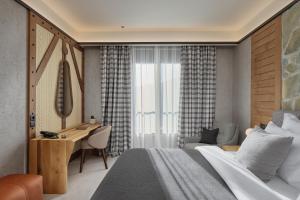 Wulfenia Hotel & Spa客房内的一张或多张床位