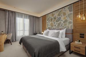 Wulfenia Hotel & Spa客房内的一张或多张床位