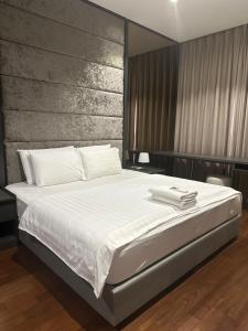 Katil atau katil-katil dalam bilik di KLCC Suites By Hibernate