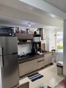 Dapur atau dapur kecil di Amplo Apto 2 quartos e 2 banheiros em cachoeirinha +24 gambar