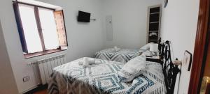 Postel nebo postele na pokoji v ubytování Casa La Barria