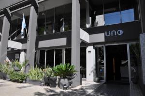 an office building with a umo sign in front of it at Uno Buenos Aires Suites in Buenos Aires