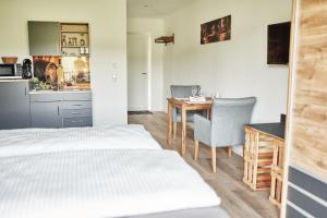 Η κουζίνα ή μικρή κουζίνα στο Weißwein Apartment