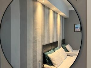 Posteľ alebo postele v izbe v ubytovaní San Frediano Boutique