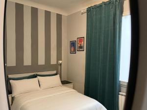 Posteľ alebo postele v izbe v ubytovaní San Frediano Boutique