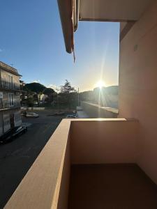 a view of the sun setting from a building at Perla del Salento in Brindisi
