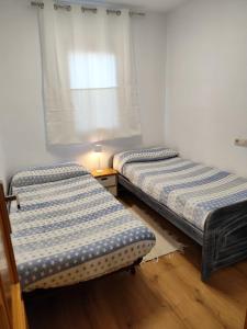 Postel nebo postele na pokoji v ubytování Casa Tequila