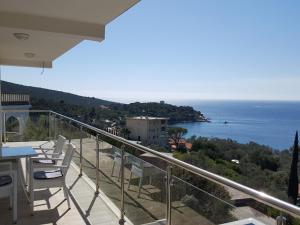 a balcony with a view of the ocean at Apartments Marovic in Herceg-Novi