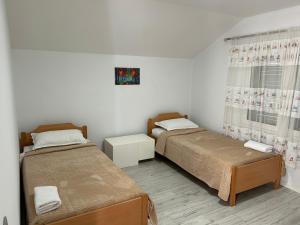 Postel nebo postele na pokoji v ubytování HENRI'S APARTAMENT