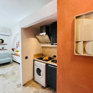 Kuchyňa alebo kuchynka v ubytovaní Lo Scoglio Apartment
