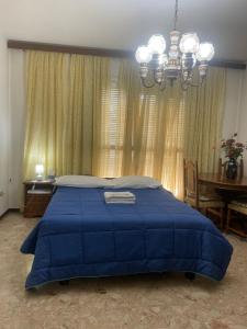 Postel nebo postele na pokoji v ubytování FAMAGOSTA Home