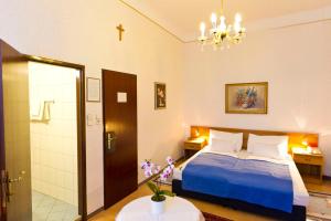 Ліжко або ліжка в номері Hotel-Pension Bleckmann