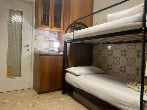 Postel nebo postele na pokoji v ubytování FAMAGOSTA Home