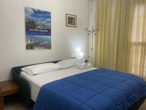 Postel nebo postele na pokoji v ubytování FAMAGOSTA Home