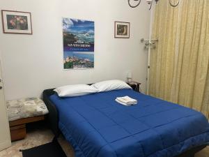 Postel nebo postele na pokoji v ubytování FAMAGOSTA Home