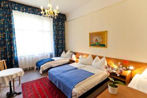 Ліжко або ліжка в номері Hotel-Pension Bleckmann