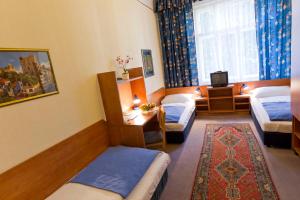 Ліжко або ліжка в номері Hotel-Pension Bleckmann