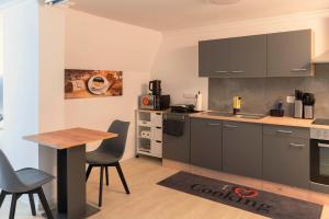 Η κουζίνα ή μικρή κουζίνα στο Bad Salzuflen Sweet Appartement +10 φωτογραφίες