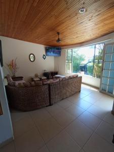 a living room with a couch and a table at CASA VACACIONAL FLANDES TOLIMA, GIRARDOT Conjunto PRIVADO in Flandes