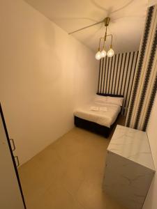 Horizon Rooms JBR客房内的一张或多张床位