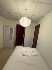 Horizon Rooms JBR客房内的一张或多张床位