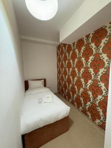Horizon Rooms JBR客房内的一张或多张床位