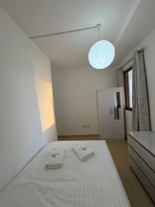 Horizon Rooms JBR客房内的一张或多张床位