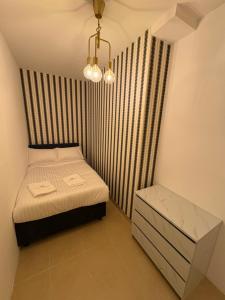 Horizon Rooms JBR客房内的一张或多张床位