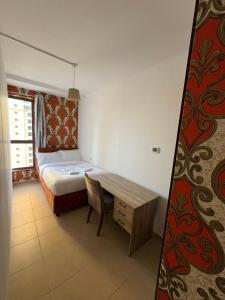Horizon Rooms JBR客房内的一张或多张床位