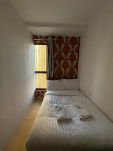 Horizon Rooms JBR客房内的一张或多张床位