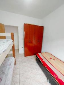Postel nebo postele na pokoji v ubytování Casa confortável em Paulinia