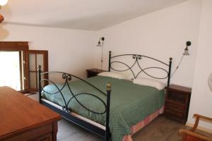 Ένα ή περισσότερα κρεβάτια σε δωμάτιο στο Mas provencal traditionnel +43 φωτογραφίες