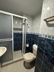 Koupelna v ubytování Hotel Astorias + 3 fotografie