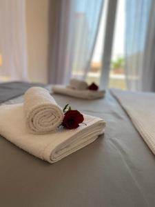 Posteľ alebo postele v izbe v ubytovaní Elite Residence Flos