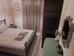 Postel nebo postele na pokoji v ubytování Katerini - Pieria