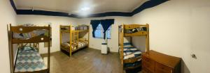 A bed or beds in a room at Hostel rivendell lima