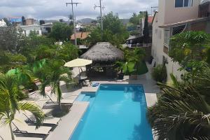 a view of a swimming pool from a building at Departamento Hanna #3 Bucerias in Bucerías