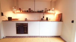 Kuchyň nebo kuchyňský kout v ubytování Idyllisk bolig i skoven