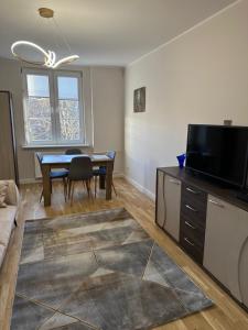 Kuchyňa alebo kuchynka v ubytovaní Gdańskie Apartamenty - Apartment Premium in Old Town + 11 fotografií