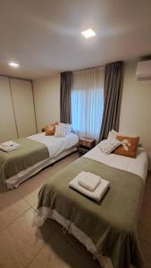 Ένα ή περισσότερα κρεβάτια σε δωμάτιο στο Casa de Descanso en Vaqueros