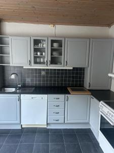 Afbeelding uit fotogalerij van Hus med 2 leiligheter in Kristiansand