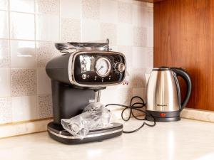 a toaster and a coffee maker on a counter at Domus Albano laziale in Albano Laziale