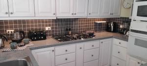 Photo de la galerie de l'établissement SeaChange Villa, à East End