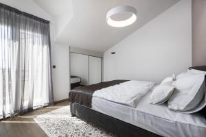 Hotel - Teranea City Hvar客房内的一张或多张床位