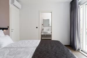 Hotel - Teranea City Hvar客房内的一张或多张床位