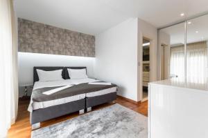 Hotel - Teranea City Hvar客房内的一张或多张床位