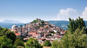 a town on top of a hill with trees at La Casa del Mugnaio in Rotonda