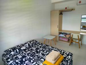 Postel nebo postele na pokoji v ubytování IFS SoHo Basic Homestay Entire Home