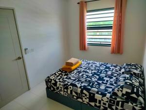 Postel nebo postele na pokoji v ubytování IFS SoHo Basic Homestay Entire Home