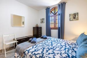 Postel nebo postele na pokoji v ubytování Las Bouganvillas Ocean View + 14 fotografií